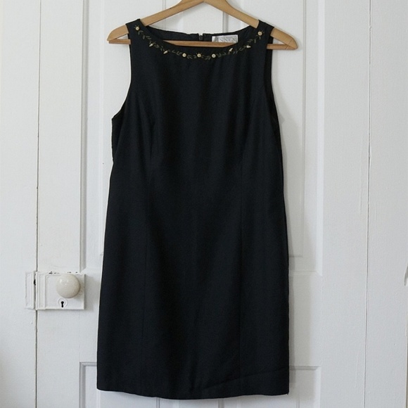 Casual Corner Dresses & Skirts - 4/$15 Black mini dress, yellow rose detail.